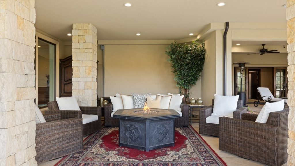 Dining room with limestone fireplace Silverado Villa Oregon